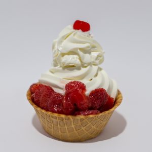 Strawberry Sundae in a Waffle Bowl with Whipped Cream and a Cherry